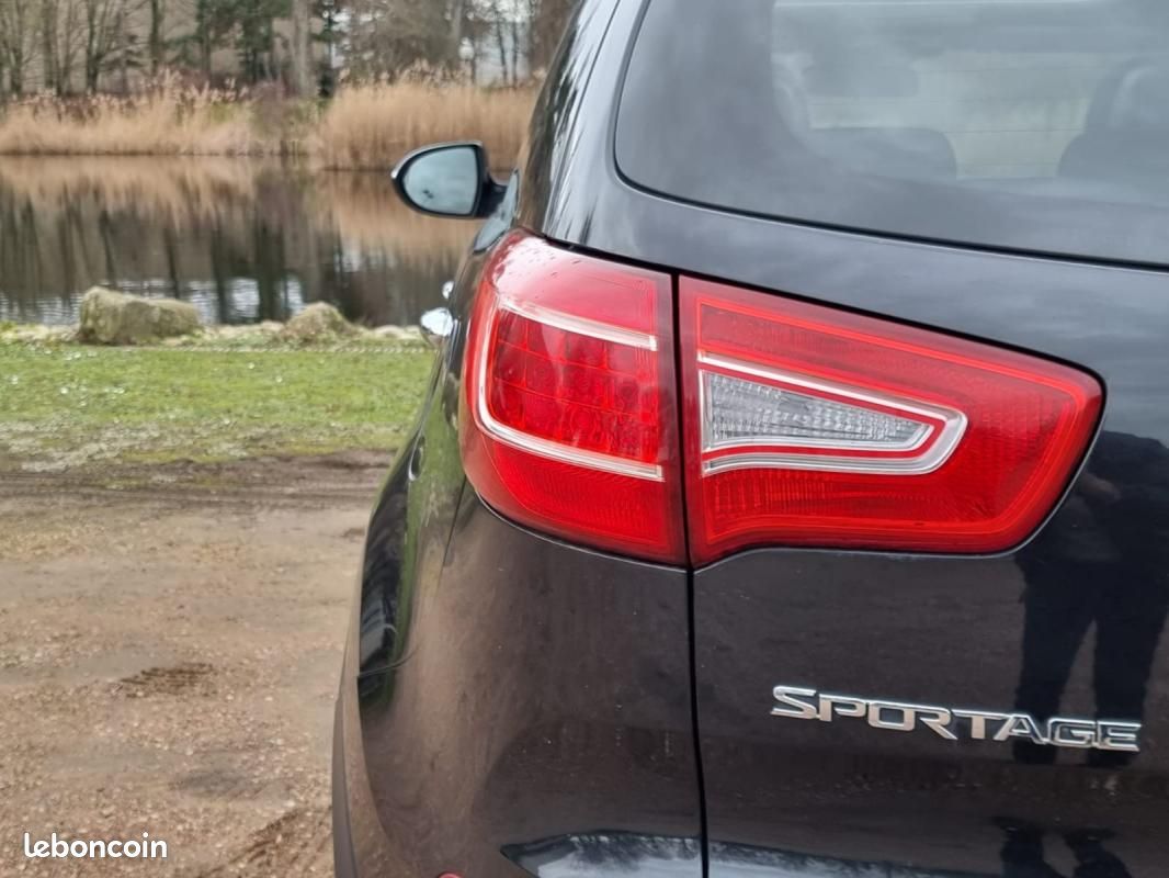 Kia Sportage 2.0 CRDi 136 4WD Premium – 4×4 Toit ouvrant CARNET