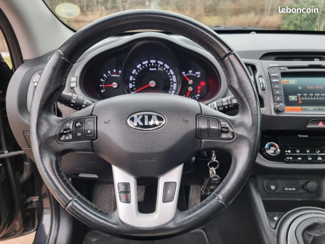 Kia Sportage 2.0 CRDi 136 4WD Premium – 4×4 Toit ouvrant CARNET